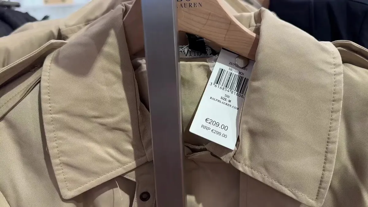Beige Lauren mid trench with its €209 price and RRP €299 tag.