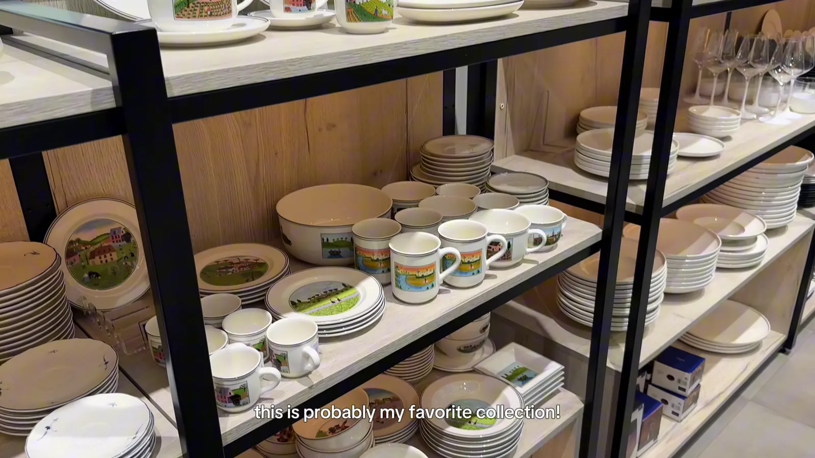 Villeroy & Boch cups, plates and bowls decorated with colourful landscape scenes.